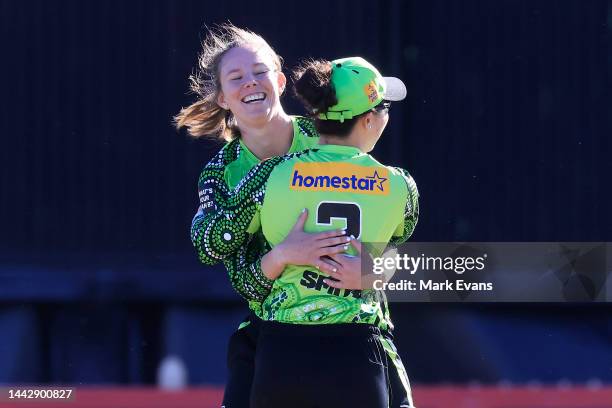 Sam Bates of Thunder celebrates the wicket of Katie Mack of the Strikers during the Women's Big Bash League match between the Sydney Thunder and the...