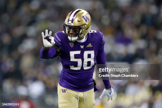 Zion Tupuola-Fetui of the Washington Huskies reacts during the second quarter against the Colorado Buffaloes at Husky Stadium on November 19, 2022 in...