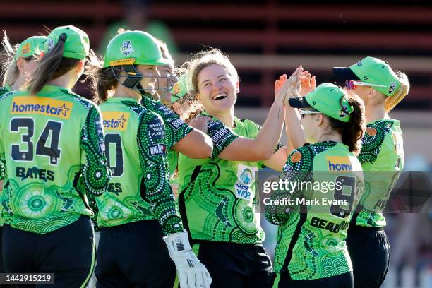 Hannah Darlington of Thunder celebrates the wicket of Bridget Patterson of the Strikers, caught and bowled during the Women's Big Bash League match...