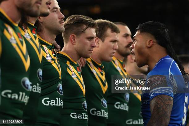 Brian To'o of Samoa faces off with Cameron Munster of Australia during the Siva Tau prior to the Rugby League World Cup Final match between Australia...