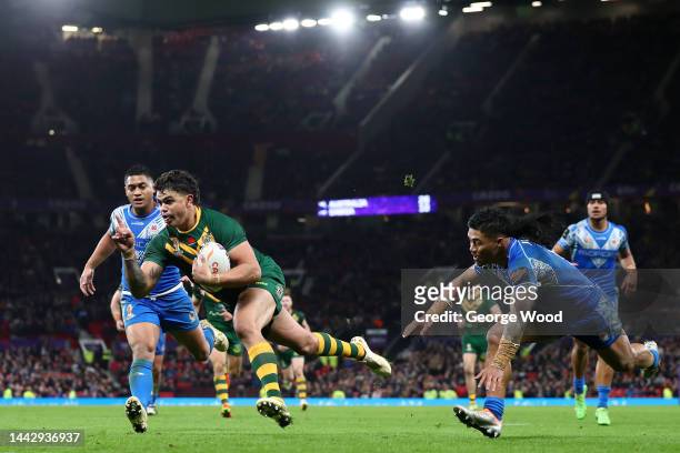 Latrell Mitchell of Australia touches down for their team's sixth try during the Rugby League World Cup Final match between Australia and Samoa at...