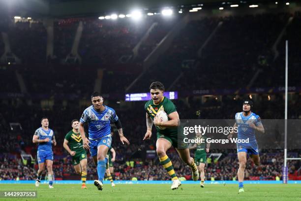 Latrell Mitchell of Australia runs in for their team's sixth try during the Rugby League World Cup Final match between Australia and Samoa at Old...