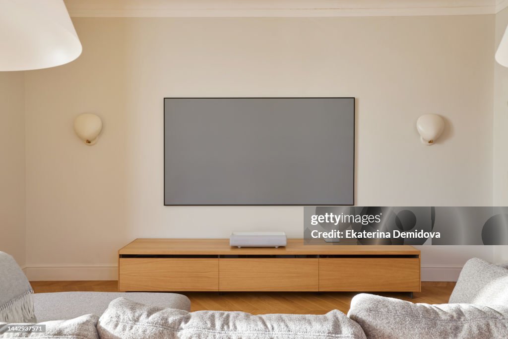 Home theater interior with a compact laser projector