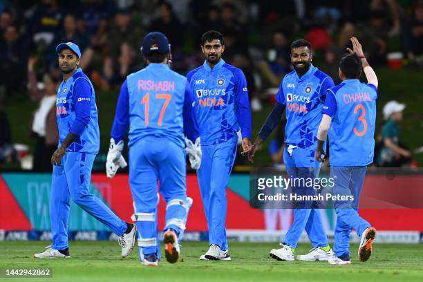 Deepak Hooda of India celebrates the wicket of Daryl Mitchell of the Black Caps during game two of the T20 International series between New Zealand...