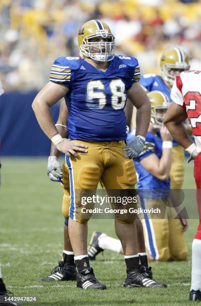 Center Joe Villani of the University of Pittsburgh Panthers look on from the field during a college football game against the Youngstown State...