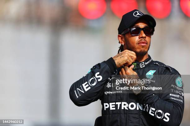 Lewis Hamilton of Great Britain and Mercedes looks on ahead of the F1 2022 End of Year photo prior to the F1 Grand Prix of Abu Dhabi at Yas Marina...