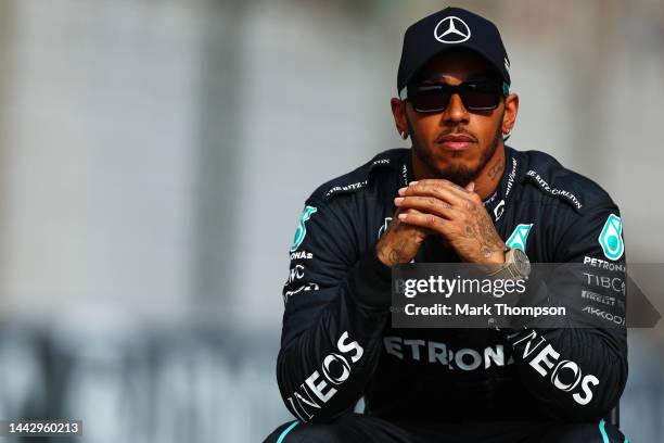 Lewis Hamilton of Great Britain and Mercedes looks on ahead of the F1 2022 End of Year photo prior to the F1 Grand Prix of Abu Dhabi at Yas Marina...