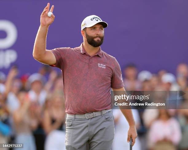 Jon Rahm of Spain celebrates on the 18th green after putting for bogey to win the Race to Dubai during Day Four of the DP World Tour Championship on...