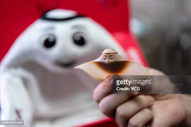Printed model of the Qatar 2022 mascot "La'eeb" is on display at a culture and art enterprise on November 17, 2022 in Gongguan, Guangdong Province of...