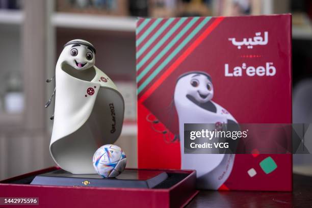 Limited edition figurine of the Qatar 2022 mascot "La'eeb" is on display at a culture and art enterprise on November 17, 2022 in Gongguan, Guangdong...