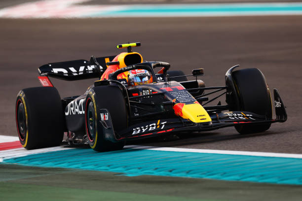 F1 Grand Prix of Abu DhabiABU DHABI, UNITED ARAB EMIRATES - NOVEMBER 20: Sergio Perez of Mexico driving the (11) Oracle Red Bull Racing RB18 on track during the F1 Grand Prix of Abu Dhabi at Yas Marina Circuit on November 20, 2022 in Abu Dhabi, United Arab Emirates. Christian Horner, Red Bull team boss.