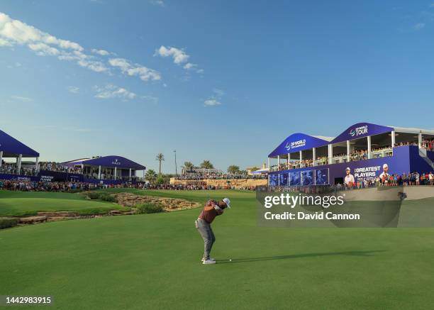 Jon Rahm of Spain plays his third shot on the 18th hole during the final round on Day Four of the DP World Tour Championship on the Earth Course at...