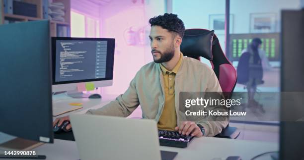 information technology, coding and man with computer working for programming, gaming and internet company. web design, database and programmer typing at desk using software, cyber network and monitor - web development stock pictures, royalty-free photos & images