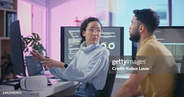 programmer, coding and communication with team at computer for project software discussion together. tech, code and programming people with backend screen at office desk for web development planning. - software programmer stock pictures, royalty-free photos & images