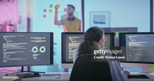 coding, programmer and it with woman at computer for data science, software development and internet in tech startup. cyber security, engineering and web design with employee in neon digital agency - mobile app stock pictures, royalty-free photos & images
