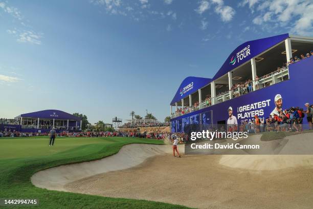 Rory McIlroy of Northern Ireland plays his third shot on the 18th hole during the final round on Day Four of the DP World Tour Championship on the...