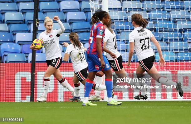 Emily Simpkins of Charlton celebrates after scoring their side's first goal during the Barclays FA Women's Championship match between Crystal Palace...