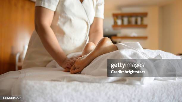 foot massage - arab feet stock pictures, royalty-free photos & images