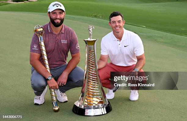 Jon Rahm of Spain and Rory McIlroy of Northern Ireland with their trophies after the final round of the DP World Tour Championship on the Earth...