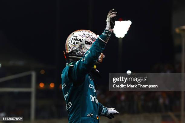 Tenth placed Sebastian Vettel of Germany and Aston Martin F1 Team waves to the crowd following his final race in F1 during the F1 Grand Prix of Abu...