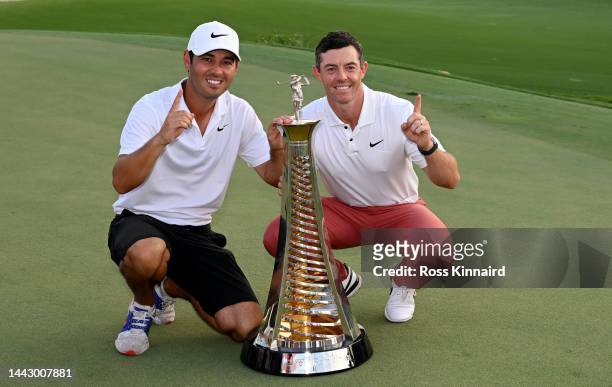 Rory McIlroy of Northern Ireland poses with the Harry Vardon Trophy with his caddie Harry Diamond after the final round on Day Four of the DP World...