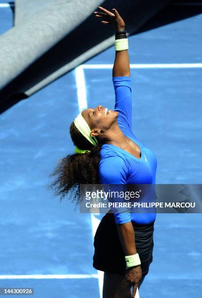 Serena Williams celebrates winning against Belorussian Victoria Azarenka during their final tennis match of the Madrid Masters on May 13, 2012 at the...