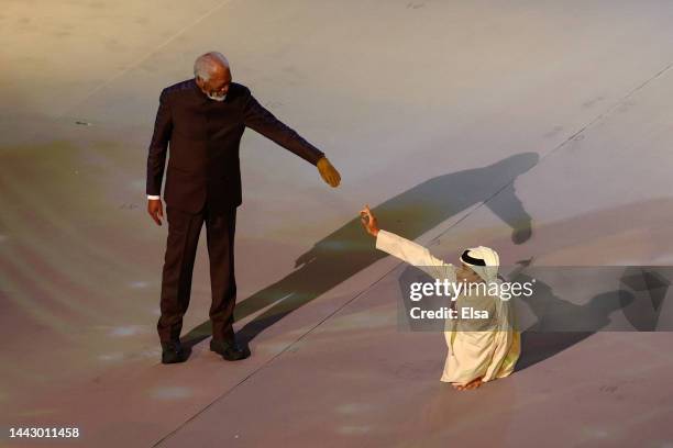 Morgan Freeman and Ghanim Al Muftah perform during the opening ceremony prior to the FIFA World Cup Qatar 2022 Group A match between Qatar and...