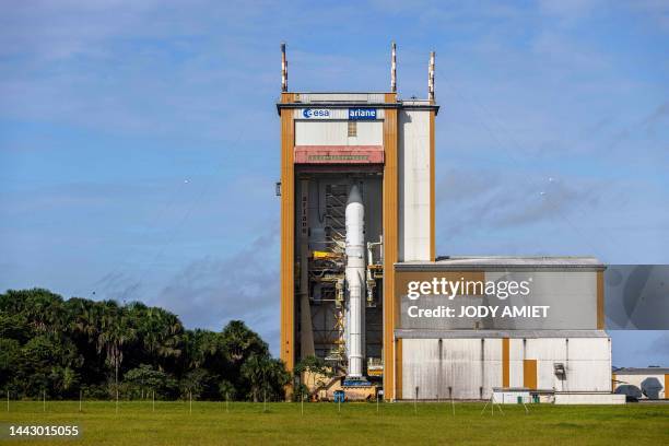 This photograph taken on July 3 shows the assembled Ariane 5 rocket at the final assembly building ahead of a planned roll to the launch pad at...