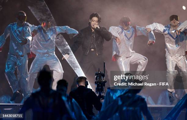 Jung Kook of BTS performs during the opening ceremony prior to the FIFA World Cup Qatar 2022 Group A match between Qatar and Ecuador at Al Bayt...