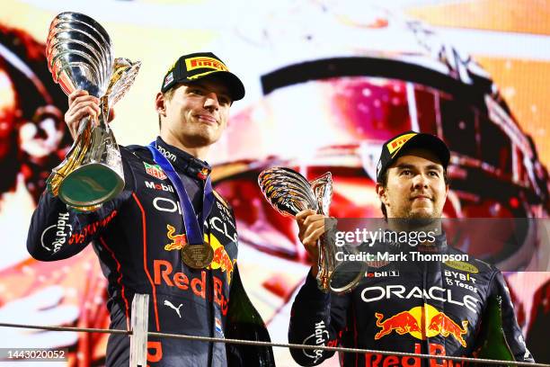 Race Winner Max Verstappen of the Netherlands and Oracle Red Bull Racing and Third placed Sergio Perez of Mexico and Oracle Red Bull Racing celebrate...