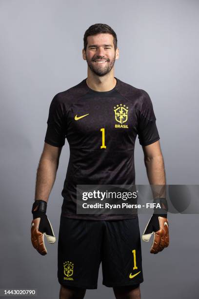 Alisson Becker of Brazil poses during the official FIFA World Cup Qatar 2022 portrait session on November 20, 2022 in Doha, Qatar.