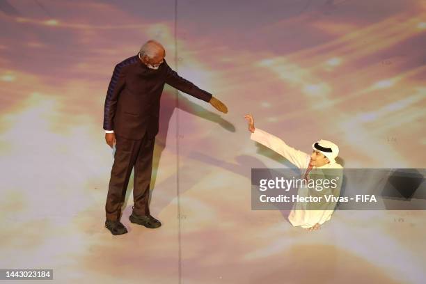 Morgan Freeman and Ghanim Al Muftah perform during the opening ceremony prior to the FIFA World Cup Qatar 2022 Group A match between Qatar and...