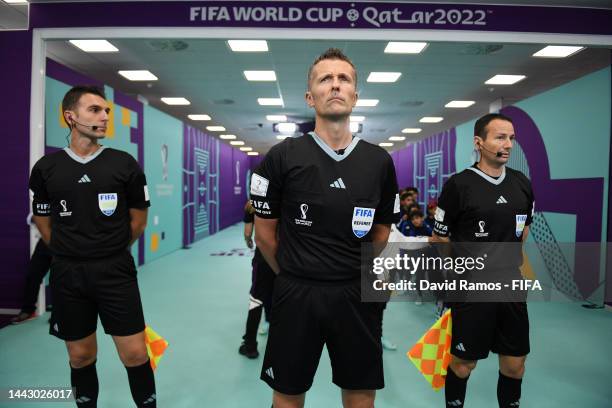 Referee Daniele Orsato and match officials are seen in the tunnel prior to the FIFA World Cup Qatar 2022 Group A match between Qatar and Ecuador at...