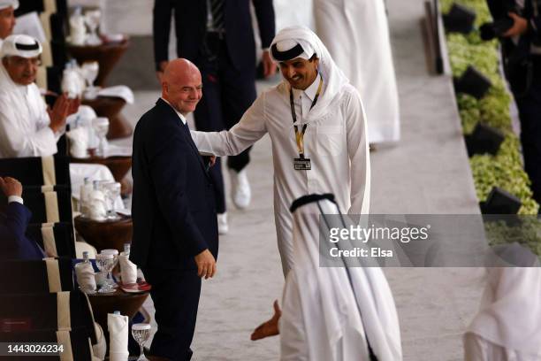 President Gianni Infantino and Qatar's Emir Sheikh Tamim bin Hamad Al Thani are seen prior to the FIFA World Cup Qatar 2022 Group A match between...