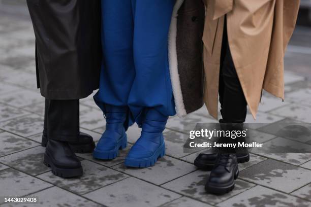 Lena Lademann is seen wearing black leather Copenhagen Studios CPH591 boots, Mango black leather pants and brown leather coat; Sonia Lyson is seen...