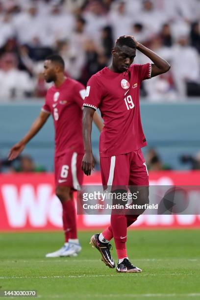 Almoez Ali of Qatar reacts after Ecuador's first goal during the FIFA World Cup Qatar 2022 Group A match between Qatar and Ecuador at Al Bayt Stadium...