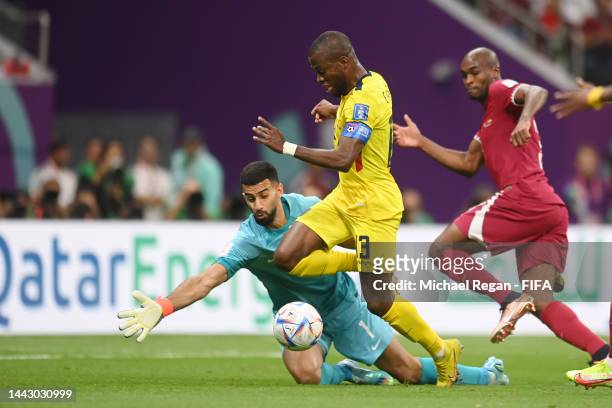 Enner Valencia of Ecuador is tripped up against Saad Alsheeb of Qatar during the FIFA World Cup Qatar 2022 Group A match between Qatar and Ecuador at...