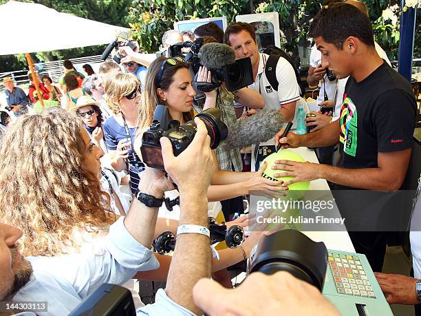 Nicolas Almagro of Spain signs autographs at the Corona Bar during day two of the Internazionali BNL d'Italia 2012 Tennis on May 13, 2012 in Rome,...