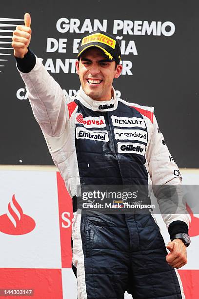 Pastor Maldonado of Venezuela and Williams celebrates on the podium after winning the Spanish Formula One Grand Prix at the Circuit de Catalunya on...