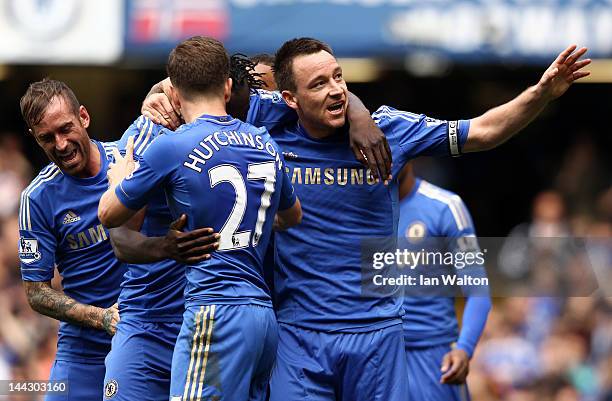 John Terry of Chelsea celebrates scoring their first goal during the Barclays Premier League match between Chelsea and Blackburn Rovers at Stamford...