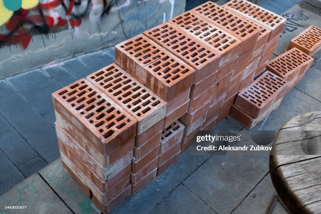 Red Bricks Building Materials On The Sidewalk A Supply Of Red Bricks Production Of ...
