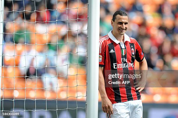 Milan's zlatan Ibrahimovic reacts during the Italian Serie A football match between AC Milan vs Novara on May 13, 2012 in Milan. AFP PHOTO / ALBERTO...