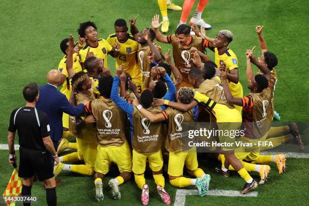 Enner Valencia of Ecuador celebrates with teammates after scoring their team's second goal during the FIFA World Cup Qatar 2022 Group A match between...