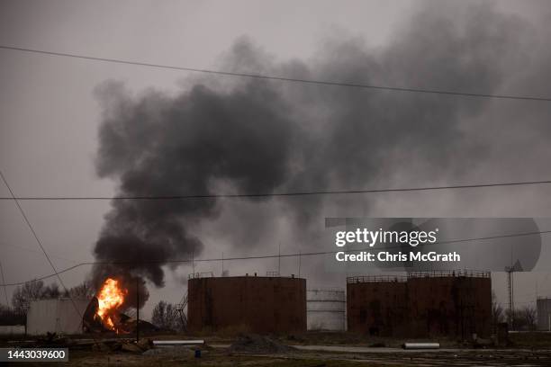 Fire continues to burn at an oil refinery after it was hit overnight by Russian forces on November 20, 2022 in Kherson, Ukraine. Ukrainian forces...