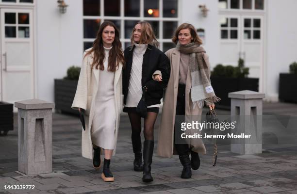 Annabel Rosendahl is seen wearing Copenhagen Studios CPH 276 Vitello black/ pale beige boots, Dorothee Schumacher creme white wool coat, The Row...