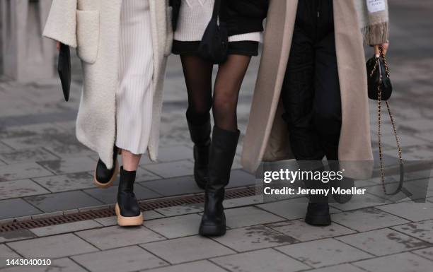 Annabel Rosendahl is seen wearing Copenhagen Studios CPH 276 Vitello black/ pale beige boots, Copenhagen Studios black clutch bag, Dorothee...