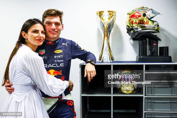 Race winner Max Verstappen of the Netherlands and Oracle Red Bull Racing and Kelly Piquet pose for a photo after the F1 Grand Prix of Abu Dhabi at...