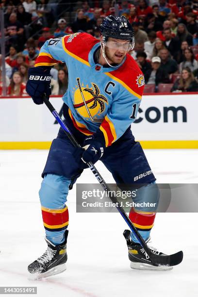 Aleksander Barkov of the Florida Panthers skates for position against the Calgary Flames at the FLA Live Arena on November 19, 2022 in Sunrise,...