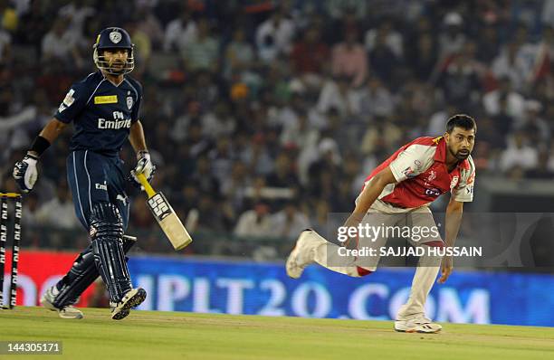 Kings XI Punjab player Praveen Kumar bowls during the IPL Twenty20 cricket match between Kings XI Punjab and Deccan Chargers at the Punjab Cricket...