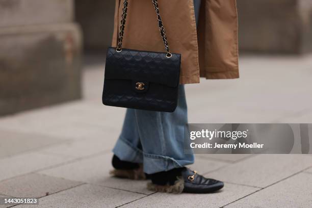 Julia Conrad seen wearing a Zara brown coat, Gucci black fur loafer, black Chanel handbag,Frankie Shop blue jeans on November 18, 2022 in Hamburg,...